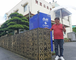 汚れていた外壁がアートに変身　沖縄の伝統織物「ミンサー」模様に　沖縄市の美里公民館